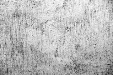 Texture of a concrete wall with cracks and scratches which can be used as a background