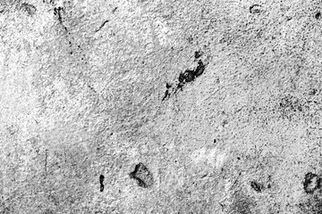 Texture of a concrete wall with cracks and scratches which can be used as a background