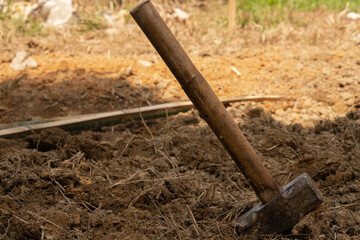 A hammer on the ground.