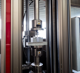 tensile strength tester machine in use.