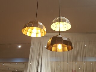 Golden lamps at the hotel room