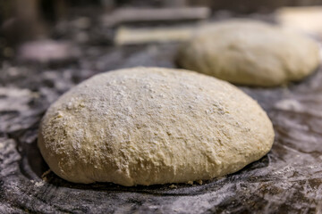 Fototapeta na wymiar High hydration rye and wheat sourdough ready for shaping artisanal rustic wholegrain sourdough bread loaf, photo series