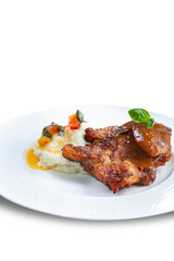 Roast Chicken served with mashed potatoes smothered in melted cheese sauce and garnish, isolated on white.