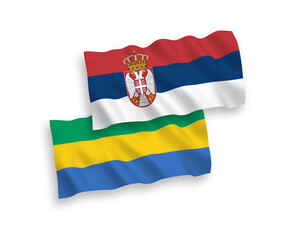 Flags of Gabon and Serbia on a white background
