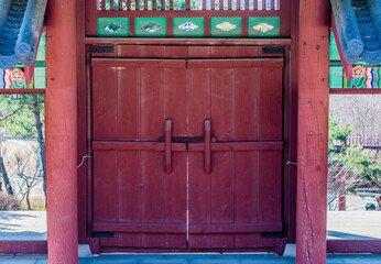 Red wooden gate