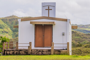 Fototapeta na wymiar Small white country church in Guam
