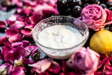 Face mask for all skin types on blackboard consisting of some black grapes, lemon, sour cream, milk, multani or mulpani mitti, making a complete face mask for a natural glow to all skin types.