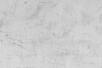 Texture of gray concrete cement wall with cracks and damage