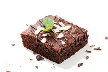 Homemade brownie with dark chocolate isolated on white background.	
