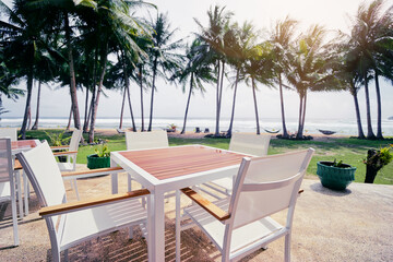 Table in resort cafe on the tropical sea beach with beautiful view.