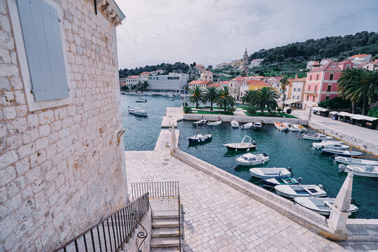 Hvar Old Town Promenade. Sea coast in Dalmatia,Croatia. A famous tourist destination on the Adriatic sea. Old town and marina.