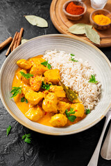 Chicken curry with rice - traditional indian food.