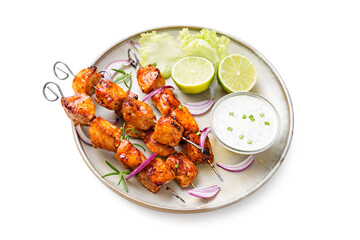 Kebabs - grilled chicken meat skewers, shish kebab with green salad leaves isolated on white background