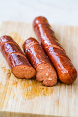 Bratwurst Sausage Filled with Emmental Cheese in Breakfast Plate.