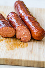 Bratwurst Sausage Filled with Emmental Cheese in Breakfast Plate.