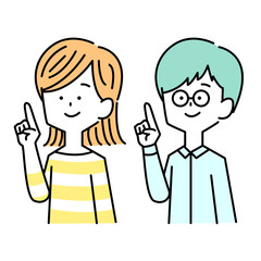 微笑んで指差しをする男女