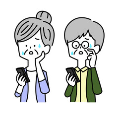 スマホを見て困惑する男女