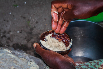 hand holding a wooden bowl