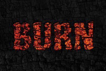 Burn lettering word from hot orange of burnt tree on black wood charcoal texture
