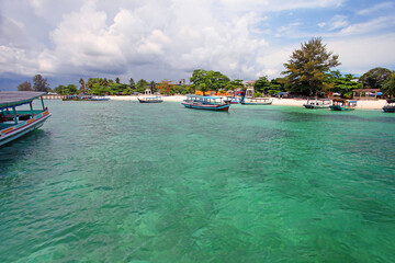 Fototapeta na wymiar Colorful boat on a tropical island in Belitung, Indonesia.