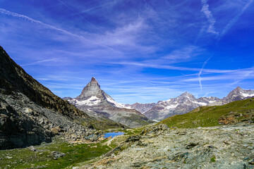 Beautiful reflection of the Mattarhorn in the small lake Riffelsee.