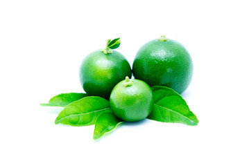 green fresh limes with leaves.