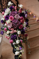flowers on the stairs. decoration at a wedding ceremony