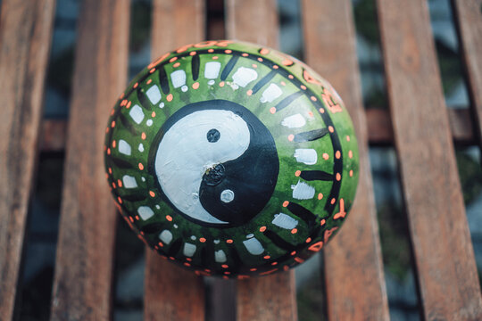 Green watermelon with a symbol of Yin and Yang