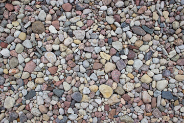 Abstract background with many stones of different shapes.