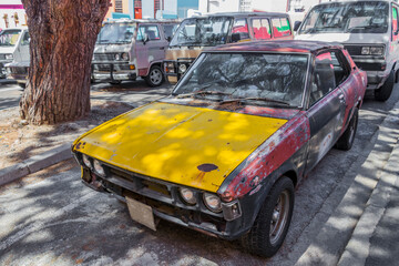 Old dirty rusted car, Bo-Kaap district, Cape Town.