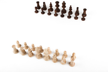 two army of chess pieces on a white background top view