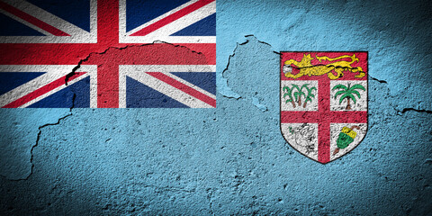 Fiji flag on cracked wall