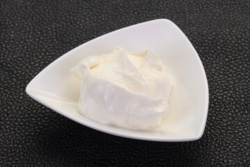 Sour cream in the bowl