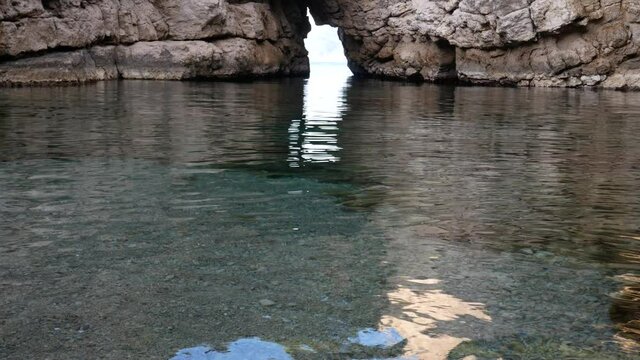 Ruins of roman Villa di Pollio Felice called Bagni della regina Giovanna (baths of Queen Giovanna) with natural rock bridge at Sorrento coast, Naples, Campania, Italy
