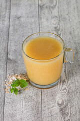 Dietary vegetarian oats milk over wooden
