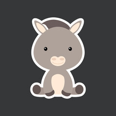 Sticker of cute baby donkey sitting. Adorable domestic animal character for design of album, scrapbook, card, poster, invitation.