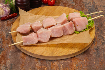 Raw pork meat skewer for grill