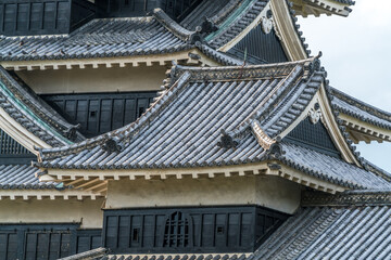 Fototapeta na wymiar Detail of Original Keep (天守) of Matsumoto Castle (松本城). Hirashiro (flatland castle) listed as Japan National Treasure. Nagano Prefecture, Japan