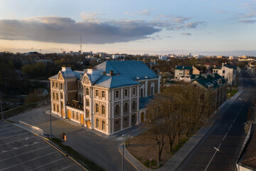 Fototapeta na wymiar Beautiful eclectic synagogue in the city center in the evening, aerial photography