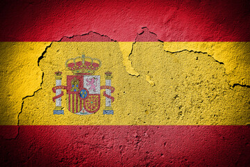 Spain flag on cracked wall