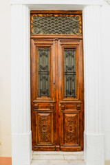 the old and solid painted wooden doors are one of the charms of the magnificent Cyclades islands, in the heart of the Aegean Sea