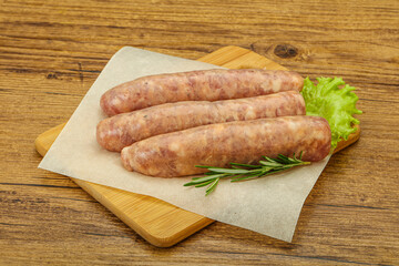 Raw pork meat sausages for grill
