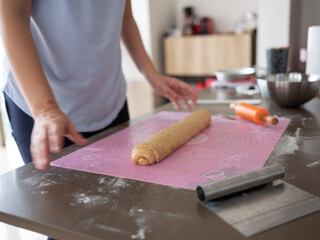 Obraz na płótnie Canvas Baking Cinnamon Roll at Home