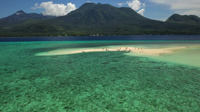 White Island sandbar and Camiguin Philippines panorama, forward aerial
