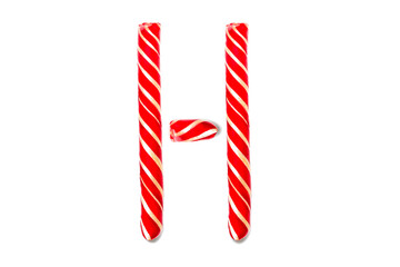 Fototapeta premium Letter C made of Red Candy Cane. Festive font C isolated on white