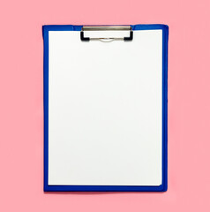 Empty white paper sheet for text on pink background.