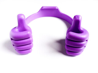 Fototapeta premium Thumbs up plastic toy on white background