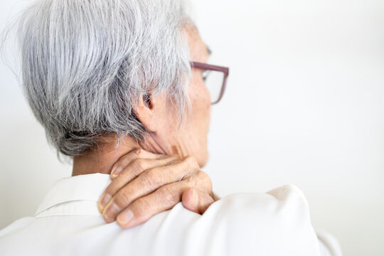 Sick Senior Woman With Back Neck And Shoulders Pain On The Joint And Muscle,stiff Neck,symptoms Sore,painful,old People Have Tension And Injury In Her Scruff,asian Elderly Holding Her Nape Of The Neck