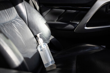 Hand sanitizer placed on car seat and exposed to sun in sunny day,do not keep alcohol antiseptic gel in the car,could start a fire,flammable objects,cause danger if parked in the sunshine,very hot day