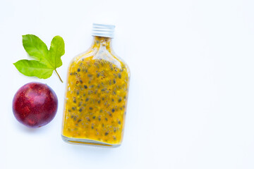 Passion fruit juice on white background.